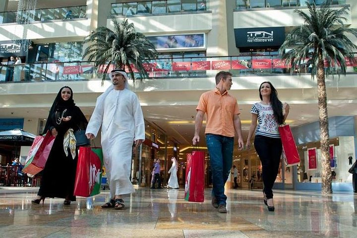 Experience the lively charm of Dubai's shopping gems from the bustling souks to the luxurious Dubai Mall perfect for souvenirs and unique finds during your special getaway.